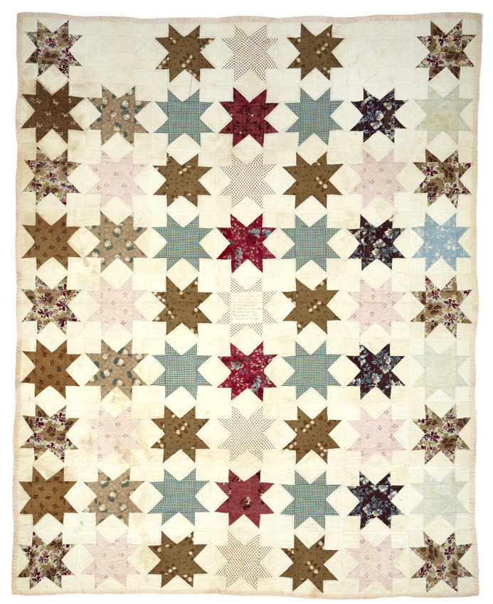Quilt with a multicolor star pattern